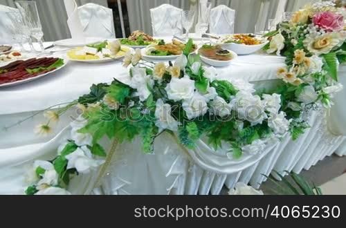 Wedding reception table set awaiting guests