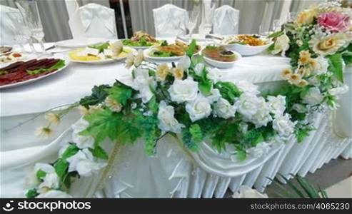 Wedding reception table set awaiting guests