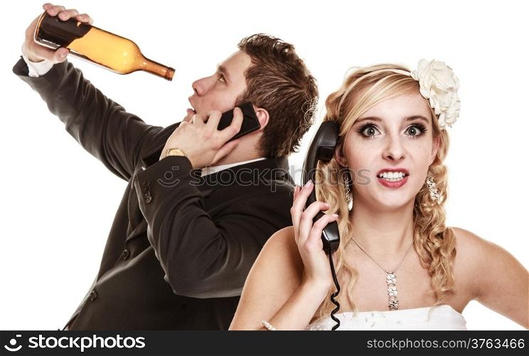 Wedding relationship difficulties. Angry woman and drunk man talking on the phone. Couple bride and groom quarelling isolated on white. Addiction and alcoholism.