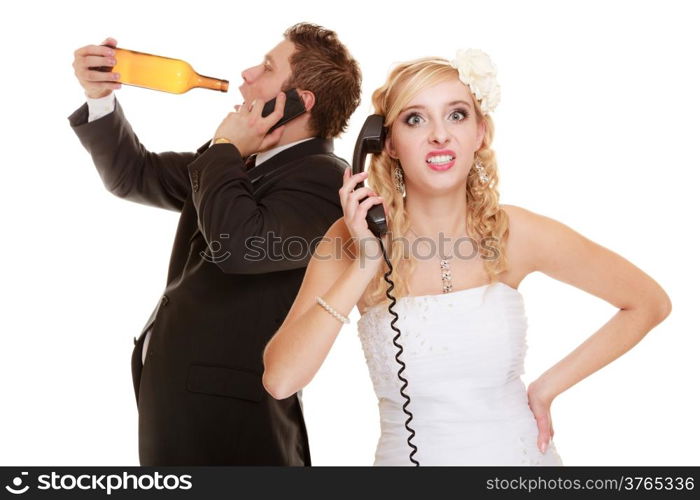 Wedding relationship difficulties. Angry woman and drunk man talking on the phone. Couple bride and groom quarelling isolated on white. Addiction and alcoholism.