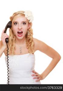 Wedding relationship difficulties. Angry woman talking on the phone. Fury bride screaming isolated on white.