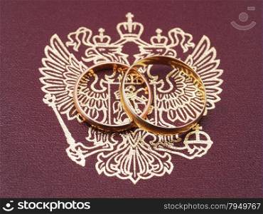 wedding rings and a Russian passport