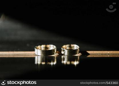 Wedding rings close-up macro shot.. Wedding rings close-up macro shot. Rings of the bride and groom