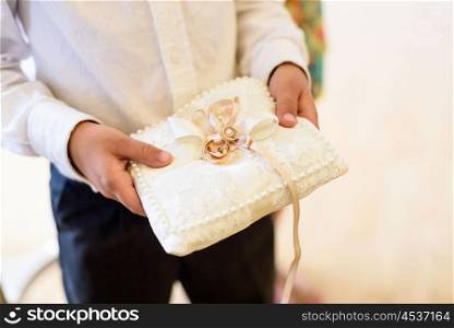 wedding rings in hand groom