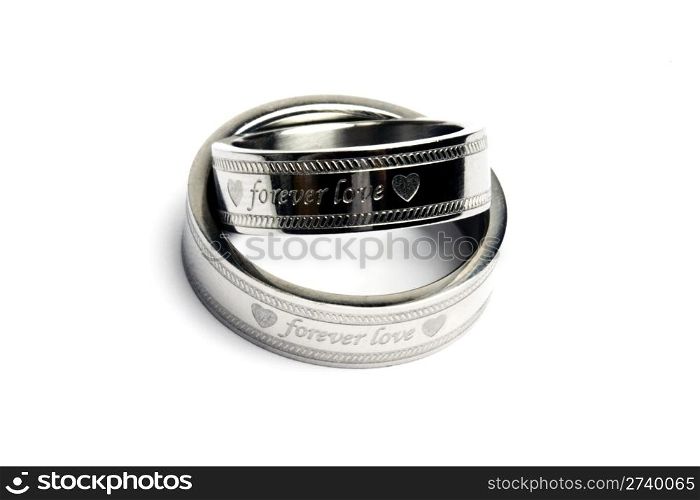 Wedding rings of Forever Love isolated on white