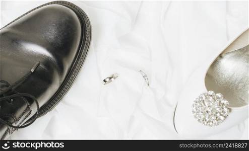 wedding rings white high heels black shoes scarf