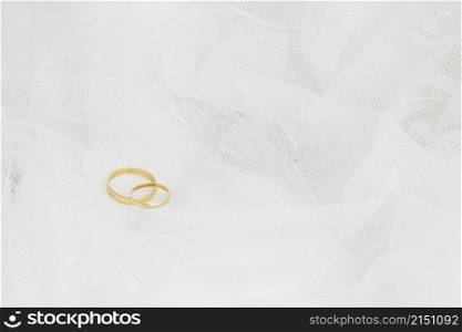 wedding rings with bridal veil