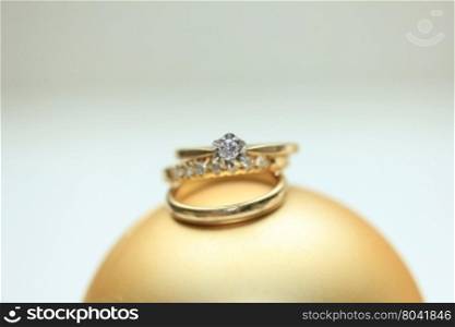 Wedding set in yellow gold: solitaire engagement ring, diamond anniversary band and plain wedding band