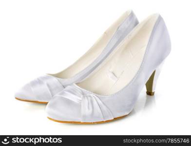 wedding shoes in front of white background
