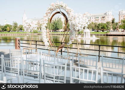 Wedding. Wedding ceremony. Arch. Arch, decorated with pink and white flowers. wedding ceremony area. outdoor wedding ceremony.decoration and decoration of an outdoor wedding ceremony