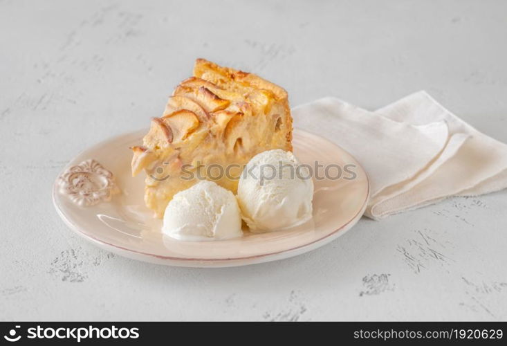 Wedge of apple cream pie with ice cream