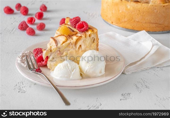 Wedge of apple cream pie with ice cream
