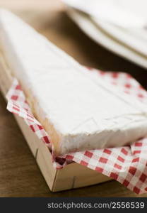 Wedge of Brie in a Wooden Box