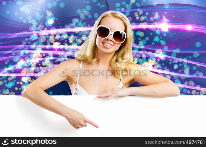 Weekend party. Young pretty woman in sunglasses with blank white banner