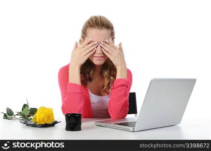 Weeping woman at a computer. Isolated on white background