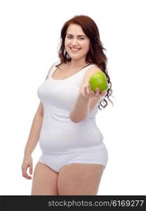 weight loss, diet, slimming, healthy eating and people concept - happy young plus size woman in underwear with green apple