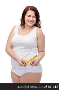 weight loss, diet, slimming, size and people concept - happy young plus size woman in underwear measuring tape
