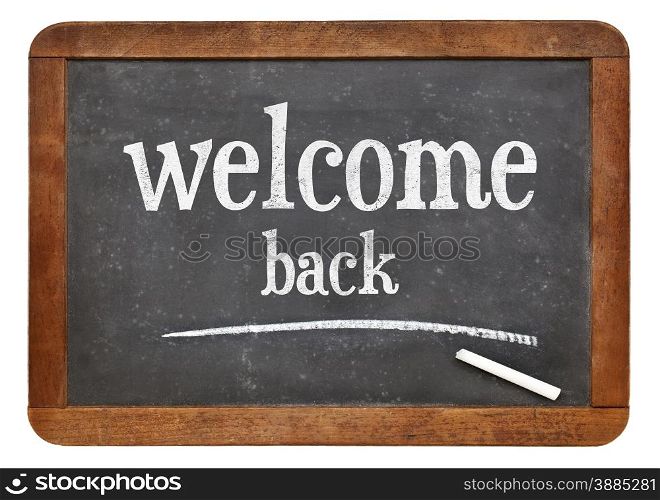 Welcome back sign - text on a vintage slate blackboard