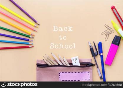 Welcome back to school background, colorful color pencil and sta. Welcome back to school background, colorful color pencil and stationery bag on yellow backgrounds with copy space
