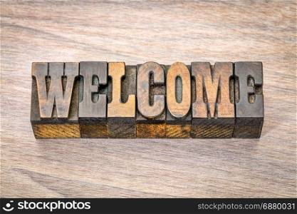 welcome banner - word in vintage letterpress wood type, French Clarendon font popular in western movies and memorabilia