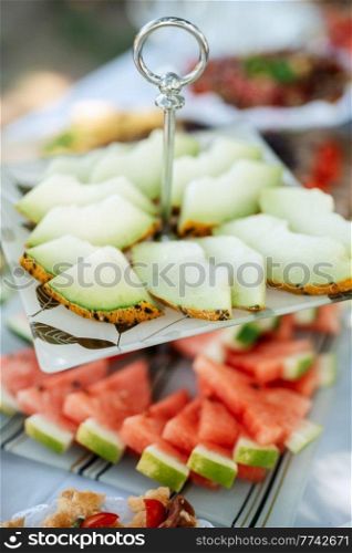 welcome buffet with alcohol and snacks, sandwiches, cupcakes