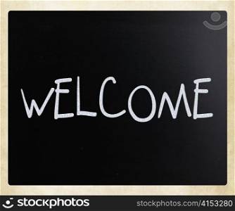 ""Welcome" handwritten with white chalk on a blackboard"