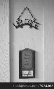 welcome sign and note box