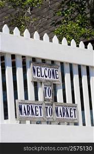 Welcome sign on a picket fence, St. George Street, St. Augustine, Florida, USA