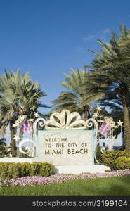 Welcome signboard in a garden, Miami Beach, Florida, USA