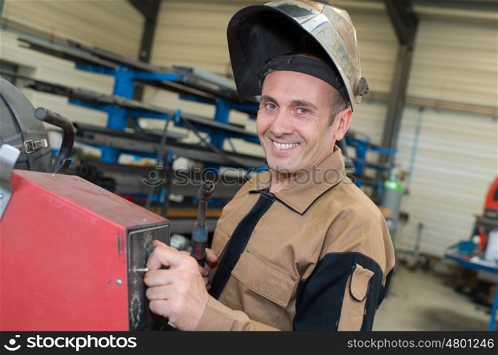 welder happy and ready to work