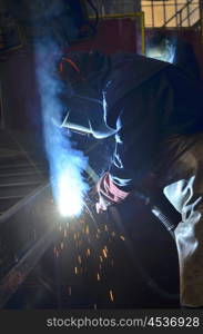 welder welding with mig-mag method