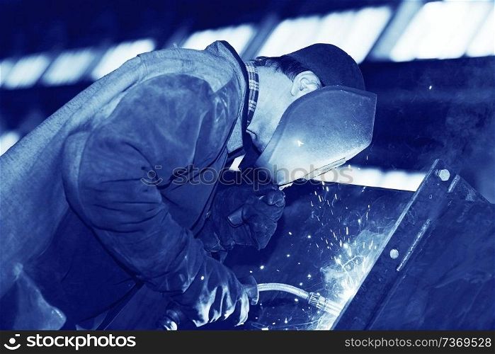 welder working at the factory