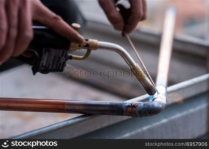 Welding of copper pipe.. Welding of copper pipe of a methane gas pipeline or of a conditioning or water system.