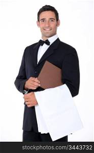 Well-dressed waiter holding menu