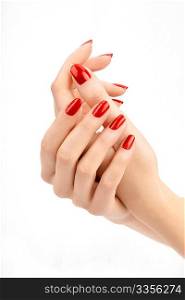 Well-groomed female hands with the beautiful manicure, isolated