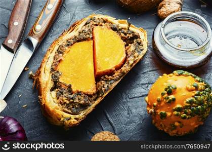 Wellington pumpkin,loaf of bread stuffed with baked mushrooms and pumpkin.. Roll stuffed with mushrooms and pumpkin.