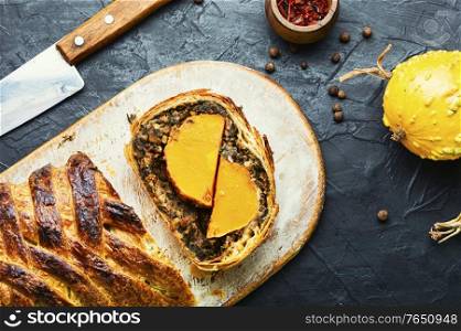 Wellington pumpkin,loaf of bread stuffed with baked mushrooms and pumpkin.. Wellington pumpkin,autumn food
