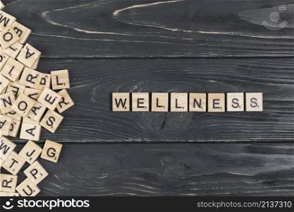 wellness word wooden background