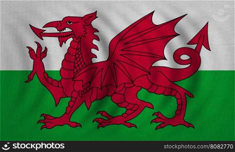 Welsh national official flag. Patriotic symbol, banner, element, background. Correct colors. Flag of Wales wavy with real detailed fabric texture, accurate size, illustration