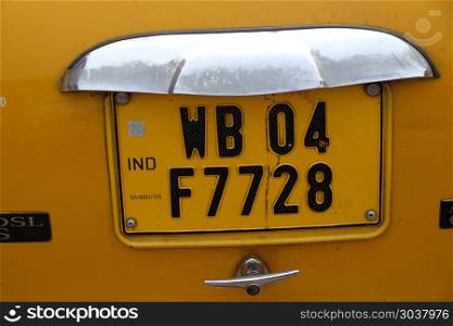 West Bengal license plate on a Ambassador car which are used as taxsi on the streets of Kolkata, India