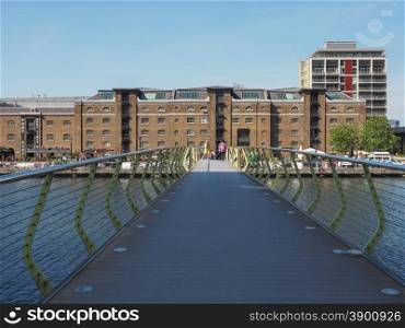 West India Quay in London. LONDON, UK - JUNE 11, 2015: Tourists visiting West India Quay in Docklands
