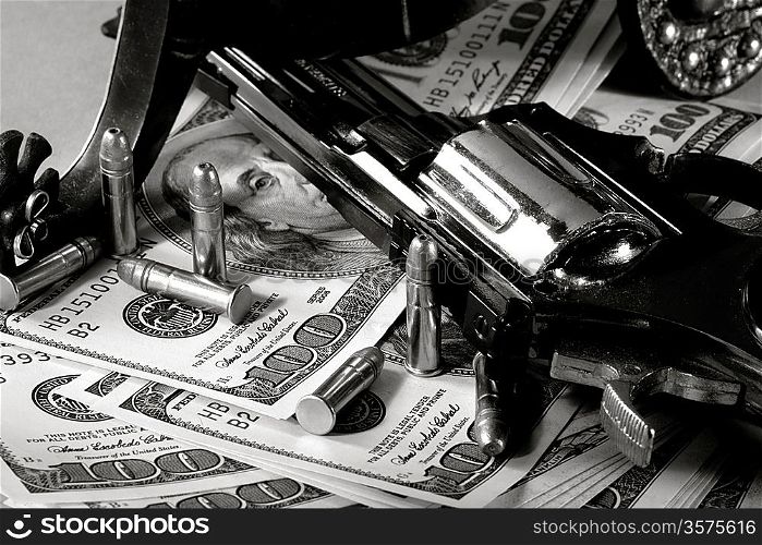 Western still life over money background. shot with view camera