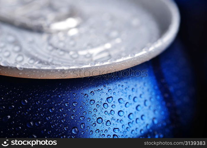 wet aluminium can with drink, close-up of top