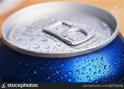 wet aluminium can with drink, close-up of top