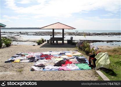 Wet clothes on the Pantai Sorake beach on the Nias island, Indonesia