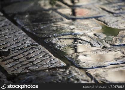 Wet cobblestone
