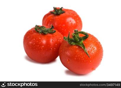 wet fresh tomato isolated on white background