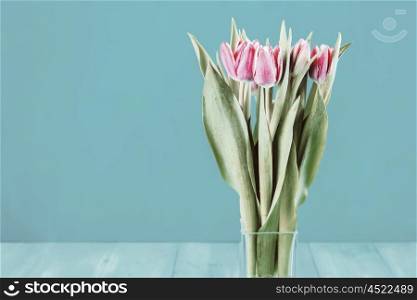 Wet Pink Tulip Flowers In Vase