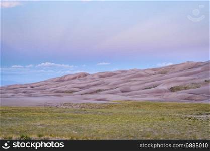 wet sand dunes patterns and texture at dawn - Great Sand Dunes National Park and Preserve in Colorado