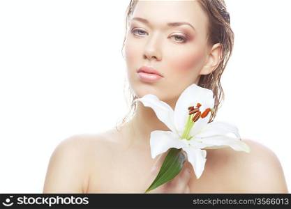 wet woman with white flower on white background